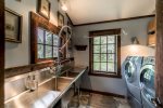 Consistent with the rest of the home, the laundry room is top of the line